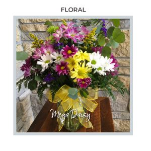 Image of the Mega Daisy floral arrangement with bright spring or summer colors by th Trig's Floral and Home department.