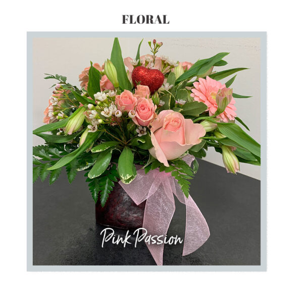 Image of the deluxe Pink Passion arrangement from Trig's Floral and Home